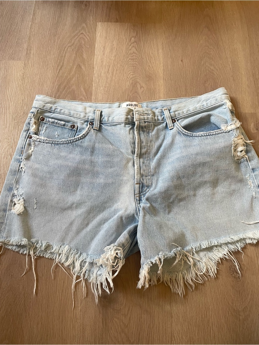 Agolde Light Wash Frayed Hem Denim Shorts
